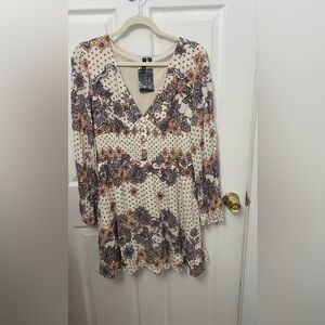 Long sleeve cream brown pattern dress.